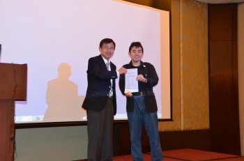 Dr. Chenchen Ding, NICT receiving a certficate for the project Open Collaboration for Developing and Using Asian Language Treebank