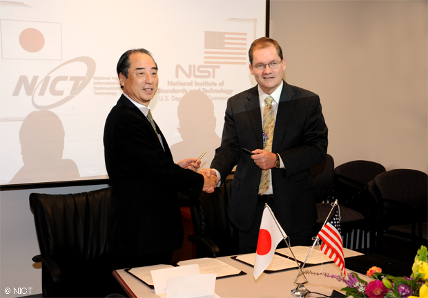 Picture taken after the signing ceremony.Left : Dr. Kazumasa Enami (Vice President of NICT) Right : Dr. Charles H. Romine (Director of ITL/NIST)